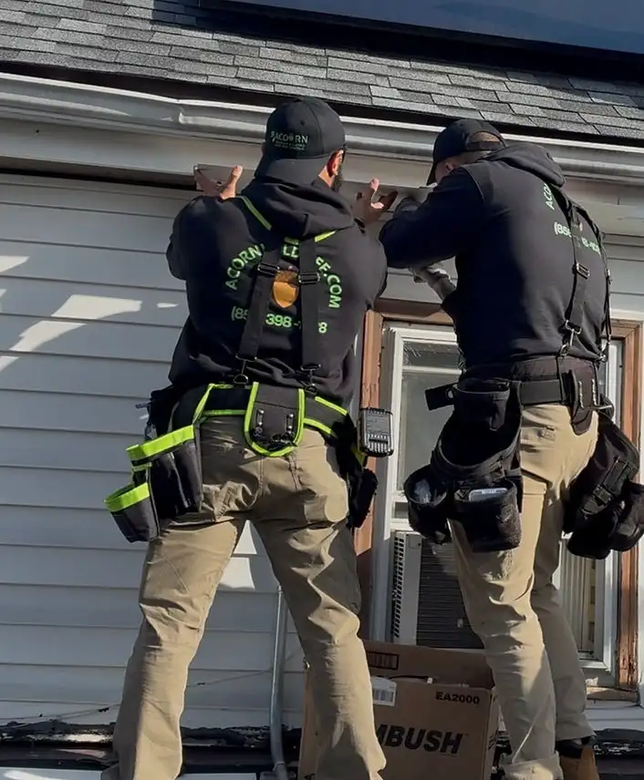 Acorn Wildlife technicians inspecting the soffit line of a South Jersey home
